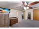 Cozy bedroom with a queen-size bed and ceiling fan at 1640 Center Rd, Terra Ceia, FL 34250