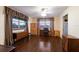 Home office featuring hardwood floors and built-in wooden cabinets at 1640 Center Rd, Terra Ceia, FL 34250