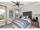 Charming bedroom with a brick feature wall and plenty of natural light at 16435 Star Grass Cir, Bradenton, FL 34211