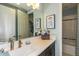 Clean bathroom with single sink vanity and bathtub at 16435 Star Grass Cir, Bradenton, FL 34211