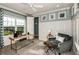 Bright home office features built-in shelving and a large window at 16435 Star Grass Cir, Bradenton, FL 34211