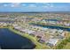 Aerial view of home with pool, located in a community with lakes at 18122 Harwich Pl, Bradenton, FL 34202