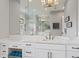 Bathroom boasts a double vanity and large mirror at 328 Monroe Dr, Sarasota, FL 34236