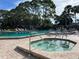 Relaxing hot tub next to the refreshing swimming pool at 3711 Pinecone Ct # 168, Sarasota, FL 34238