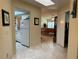 Hallway with a view of kitchen and living room at 3711 Pinecone Ct # 168, Sarasota, FL 34238