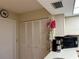 Kitchen with white appliances and pantry at 3711 Pinecone Ct # 168, Sarasota, FL 34238