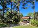 Community grilling area with picnic tables under a gazebo at 3711 Pinecone Ct # 168, Sarasota, FL 34238