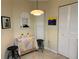 Kitchen nook with small table, chairs and artwork at 3711 Pinecone Ct # 168, Sarasota, FL 34238