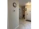 Hallway with light walls, tile floors and access to other rooms at 3711 Pinecone Ct # 168, Sarasota, FL 34238