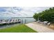 Waterfront picnic tables and grassy area at 3808 Gulf Of Mexico Dr # E307, Longboat Key, FL 34228