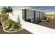 Modern garage building with multiple units and parking at 3866 Clover Ln, Sarasota, FL 34233