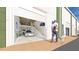 Spacious garage interior with cars and motorcycles at 3866 Clover Ln, Sarasota, FL 34233