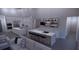 Modern kitchen with breakfast bar and appliances at 440 S Lime Ave, Sarasota, FL 34237