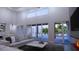 Living room with access to backyard and pool at 440 S Lime Ave, Sarasota, FL 34237