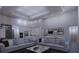 Spacious living area with large windows and fireplace at 440 S Lime Ave, Sarasota, FL 34237