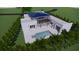 Aerial view showing home, pool, and patio at 440 S Lime Ave, Sarasota, FL 34237