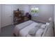 Bright bedroom with a queen-size bed, workspace, and view at 440 S Lime Ave, Sarasota, FL 34237