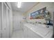 Laundry room with washer, dryer, and storage at 4573 Pine Green Trl # 1, Sarasota, FL 34241