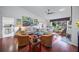 Light and airy living room with hardwood floors and ample seating at 4573 Pine Green Trl # 1, Sarasota, FL 34241
