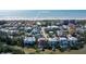 Scenic aerial view of a coastal neighborhood with a sandy beach and direct beach access at 467 Canal Rd # 467, Sarasota, FL 34242