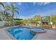 Relaxing pool and spa area with canal views at 467 Canal Rd # 467, Sarasota, FL 34242