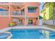 Inviting backyard with a pool, hot tub, outdoor seating, and a spiral staircase, perfect for relaxation at 467 Canal Rd # 467, Sarasota, FL 34242