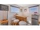 Charming bar area with stools, refrigerator and natural light at 467 Canal Rd # 467, Sarasota, FL 34242