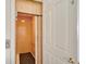 Residential elevator with a wooden interior and an accessible design at 467 Canal Rd # 467, Sarasota, FL 34242