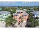 Large two-story home with a gray metal roof and two car garage at 467 Canal Rd # 467, Sarasota, FL 34242