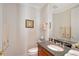 Clean bathroom with dark vanity and updated fixtures at 467 Canal Rd # 467, Sarasota, FL 34242