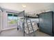 bedroom with bunk beds, window, and ample closet space at 467 Canal Rd # 467, Sarasota, FL 34242