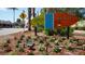 Siesta Key Village entrance sign with flowers at 467 Canal Rd # 467, Sarasota, FL 34242