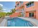 Inviting pool and patio with spiral staircase at 467 Canal Rd # 467, Sarasota, FL 34242