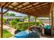 Covered patio with pergola and outdoor seating area at 4817 Sarasota Ave, Sarasota, FL 34234