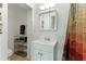 Clean bathroom with white vanity, shower/tub combo and updated fixtures at 4817 Sarasota Ave, Sarasota, FL 34234