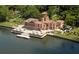 Stunning aerial view of an estate surrounded by water, exuding luxury and showcasing remarkable architecture at 4817 Sarasota Ave, Sarasota, FL 34234