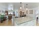 Open concept kitchen with island and granite countertops at 4817 Sarasota Ave, Sarasota, FL 34234