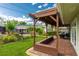 Covered patio with pergola, seating area, and view of backyard at 4817 Sarasota Ave, Sarasota, FL 34234