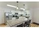 Modern kitchen with granite countertops and stainless steel appliances at 4817 Sarasota Ave, Sarasota, FL 34234