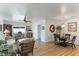Open concept living and dining area with hardwood floors and a ceiling fan at 4817 Sarasota Ave, Sarasota, FL 34234