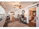 Home office features built-in desk, hardwood floors, and views into the kitchen and bedroom at 6947 Antigua Pl, Sarasota, FL 34231