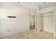 Empty bedroom with neutral walls and carpet, featuring a large closet at 7819 Ashley Cir, Bradenton, FL 34201