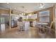 Bright kitchen with stainless steel appliances and white cabinets at 8019 Haven Harbour Way, Bradenton, FL 34212