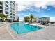 Resort-style pool with plenty of lounge chairs and a relaxing atmosphere at 111 S Pineapple Ave # 1004, Sarasota, FL 34236