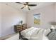 Virtually staged bedroom with a dresser and a bed at 11322 78Th E St, Parrish, FL 34219