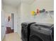 Laundry room with washer, dryer and shelving at 11322 78Th E St, Parrish, FL 34219