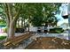 Community picnic tables and grills at 1328 Siesta Bayside Dr # 1328-C, Sarasota, FL 34242