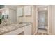 Bathroom features granite vanity, tiled floor, and shower stall at 1328 Siesta Bayside Dr # 1328-C, Sarasota, FL 34242