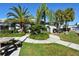 Relaxing outdoor space with picnic tables and grills at 1328 Siesta Bayside Dr # 1328-C, Sarasota, FL 34242