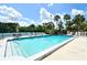 Inviting community pool with ample lounge chairs at 1328 Siesta Bayside Dr # 1328-C, Sarasota, FL 34242